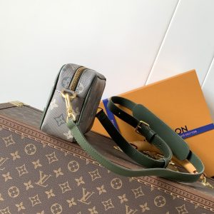 Alternative view of • Monogram coated canvas • Distressed cowhide leather trim • Fabric lining • Antiqued metal hardware • Zipper closure • Main compartment • Front corner reinforcement • Front appliqué • Shoulder strap: Detachable, adjustable • Strap length: 42.0 cm • Adjustable to: 55.0 cm